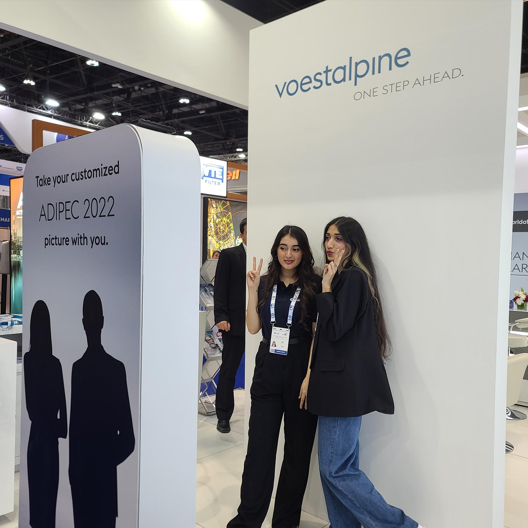 Guests enjoying an AI-powered photo booth with instant background removal and immersive virtual scenes—no green screen required.