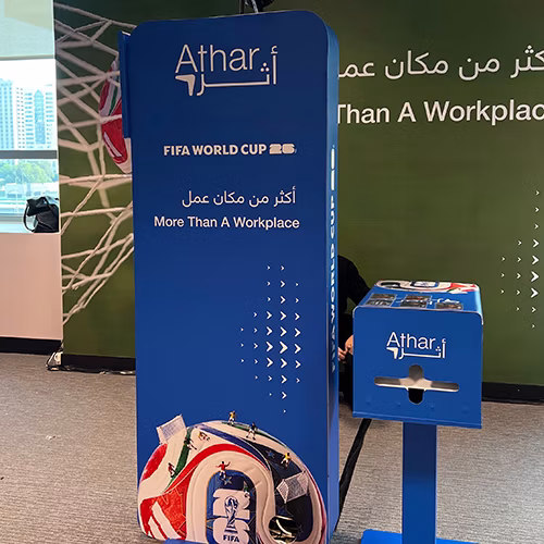 AI Trading Cards Photo Booth activation, printing custom personalized collectible cards for guests at a corporate event in Dubai