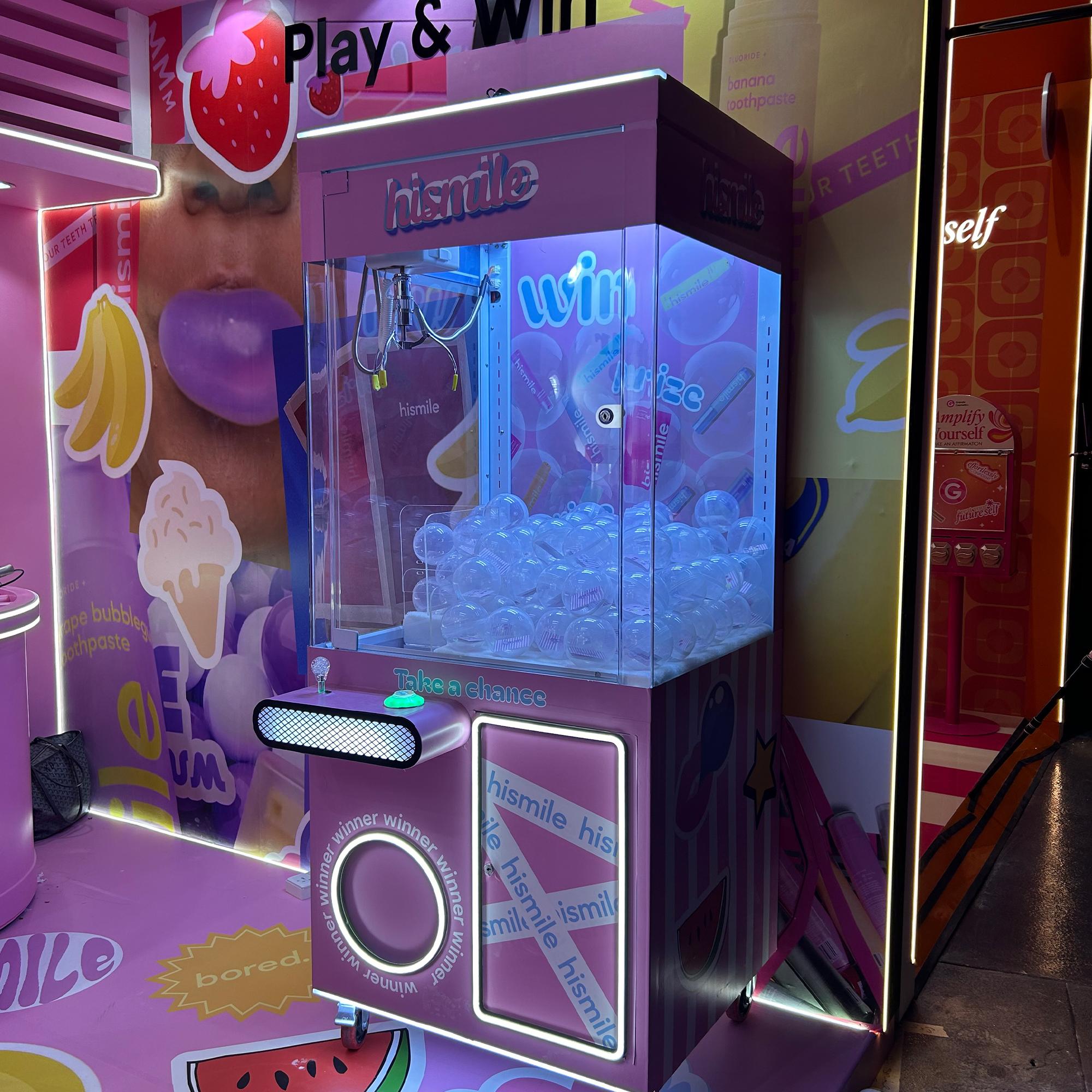 EXPLORE CLAW MACHINE FROM MIRROR BOOTH EVENT SERVICES L.L.C, PROVIDING TOP EVENT SERVICES IN DUBAI.
