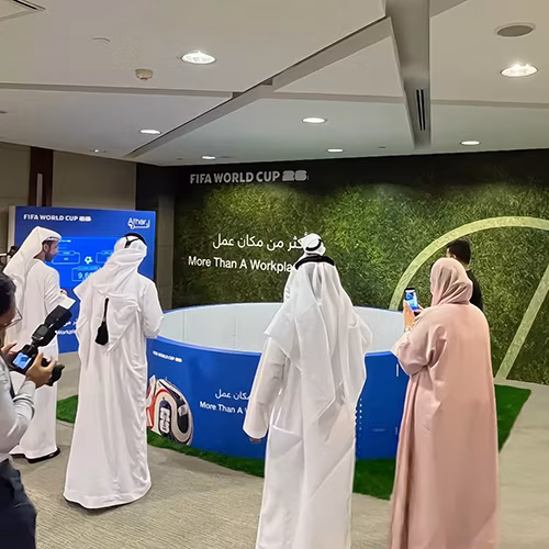 Custom-branded Interactive Football Arena setup at a Dubai exhibition venue with an electronic leaderboard for competition