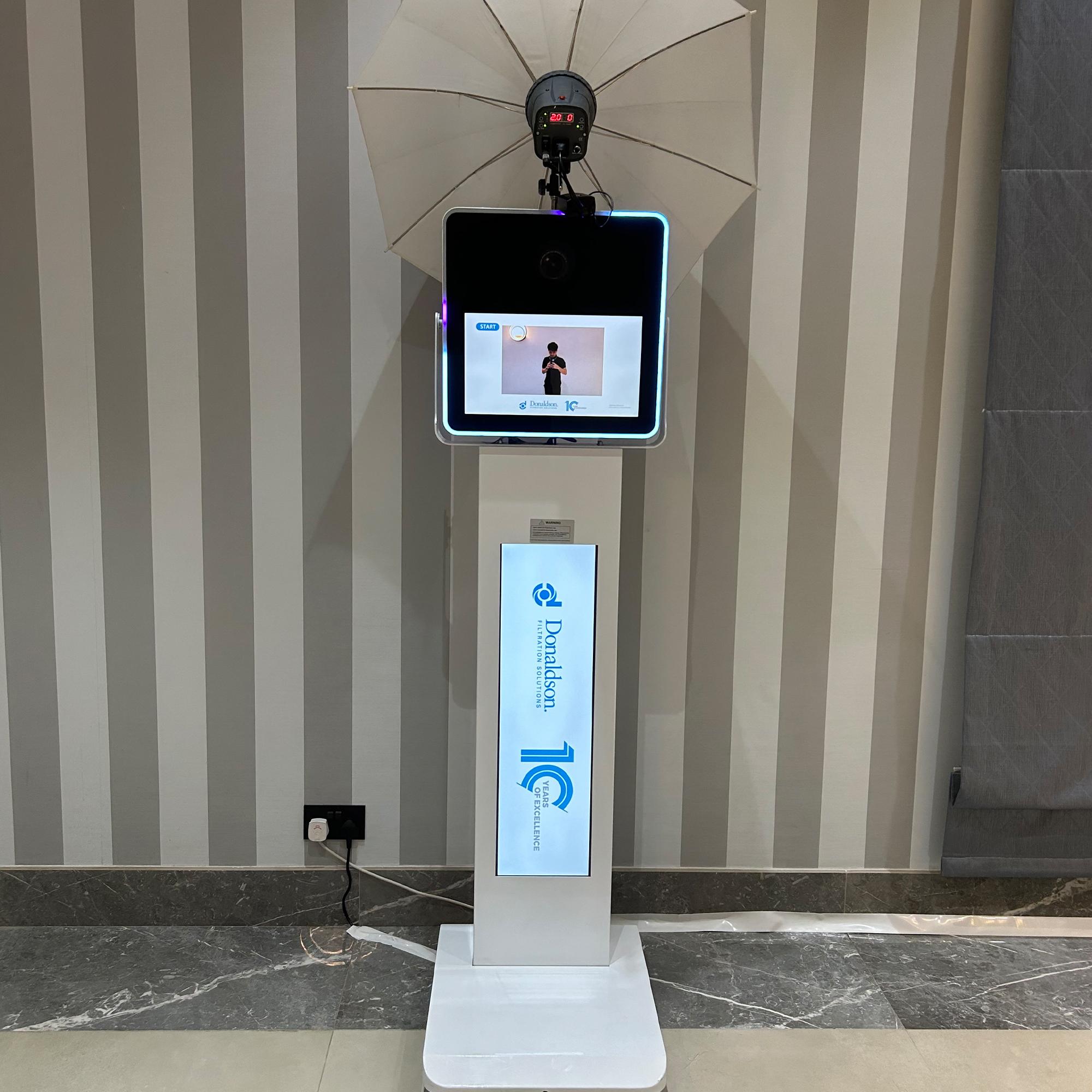 ELEVATE YOUR EVENT WITH OUR MINI PHOTO BOOTH & LED TV! DISPLAY YOUR BRAND SEAMLESSLY + UNLIMITED PRINTS. PERFECT FOR DUBAI EVENTS. BOOK THIS COMPACT SOLUTION NOW!