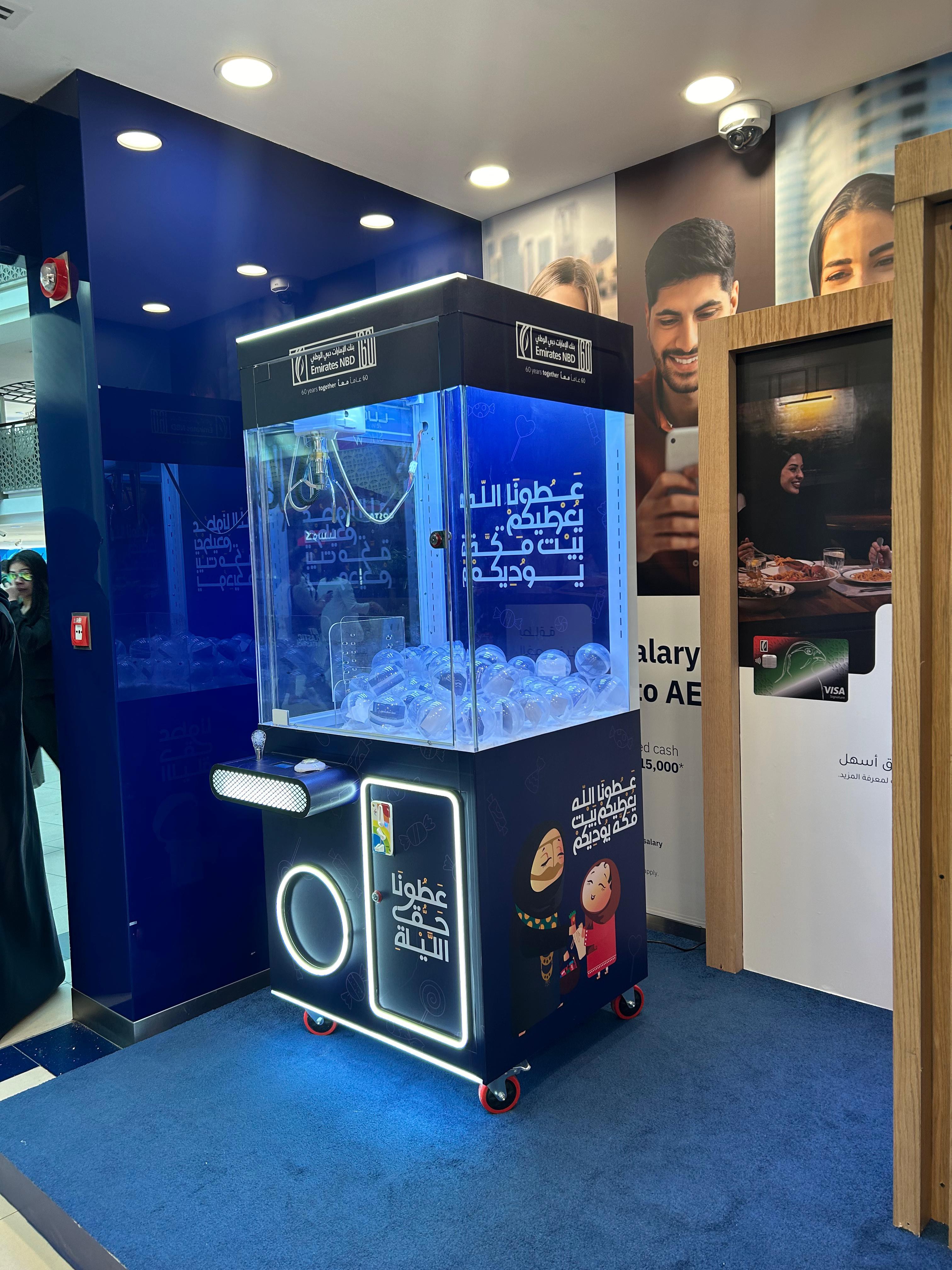EXPLORE CLAW MACHINE FROM MIRROR BOOTH EVENT SERVICES L.L.C, PROVIDING TOP EVENT SERVICES IN DUBAI.