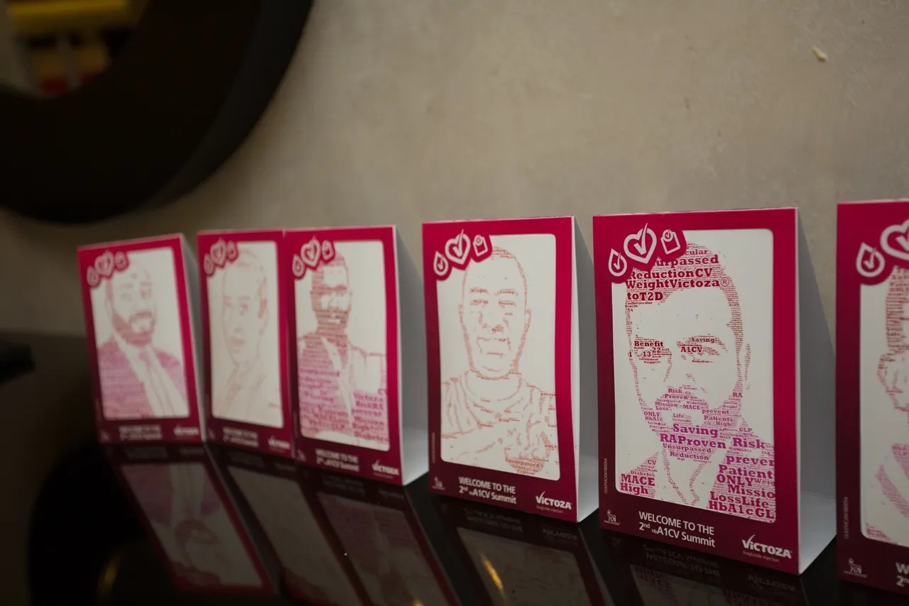 Guest using Text Selfie Photo Booth at an event in Dubai, receiving a printed word cloud image made from their photo with custom branded text for marketing activation